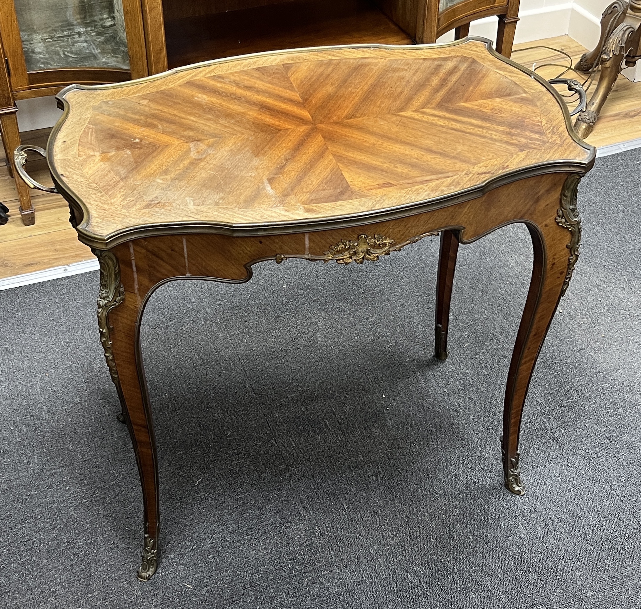 A French gilt metal mounted 'tray top' occasional table, width 79cm, depth 45cm, height 66cm